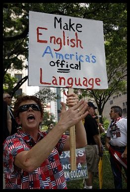 http://www.bradblog.com/Images/Protestor_EnglishOfficalLanguage.jpg